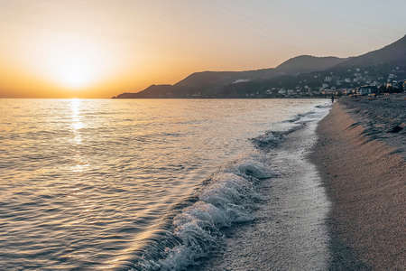 Beautiful sunset at the sea, calm and peaceful.の写真素材