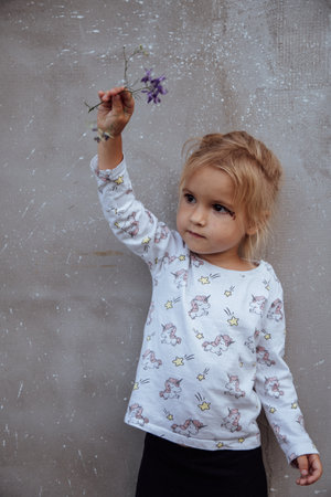 Portrait of a little happy child with a wound on the face.の写真素材