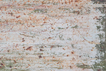 iron surface is covered with old paint, texture background