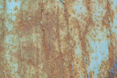 surface of rusty iron with remnants of old paint, grunge metal surface, texture background