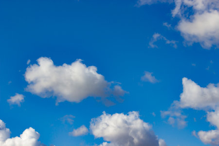 Beautiful summer blue sky with white clouds for background.の写真素材