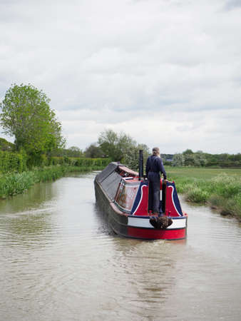 A vintage working canal boat seen on the South Oxford Canalの写真素材