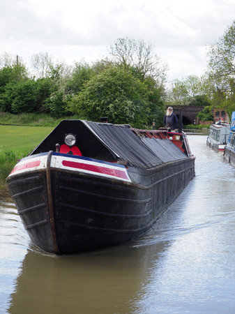 A vintage working canal boat seen on the South Oxford Canal
