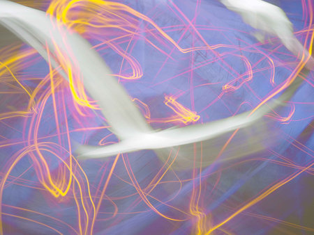 An abstract background of light trails and swirls