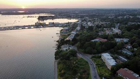 An aerial view of the sandbanks peninsula in Poole Harbour at sunset