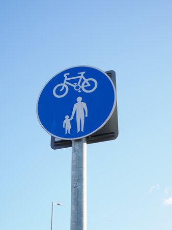 close up of a UK official sign marking a shared walking and cycling pathwayの写真素材