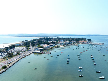 aerial view of Sandbanks Peninsula and Poole Harbour Dorset UKの写真素材