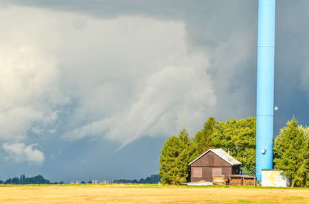 Dark storm clouds cumulonimbus from a supercell thunderstorm during a severe weather outbreakの写真素材