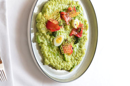 beautiful food background, green creamy asparagus risotto, serving in restaurant. decoratedの写真素材