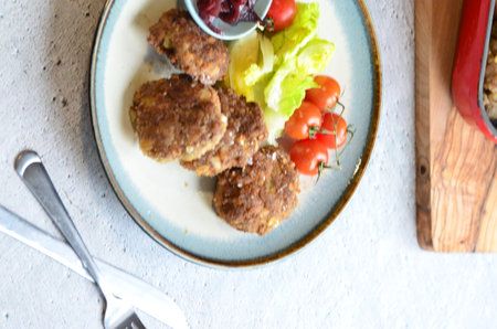 Fried meatballs with vegetables on the table. Selective focus.の写真素材