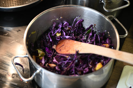 Cooking red cabbage in a casserole on a restaurant kitchenの写真素材