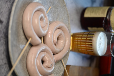 Sausage on skewers in wine cellar. Selective focus.の写真素材