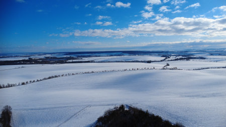 Aerial view of winter landscape with snow covered fields and meadows, Hnevosice, Silesia, Opavaの写真素材