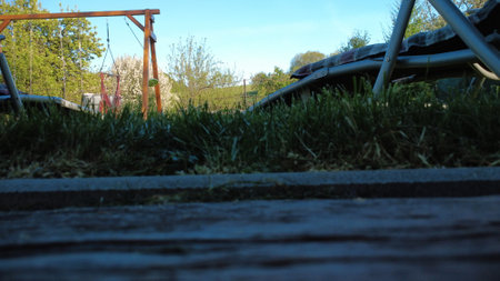 Empty seats and lounge chairs on a sunny dayの写真素材