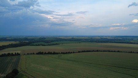 Aerial view of fields and meadows at sunset, Poland.