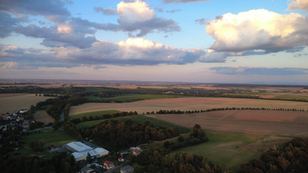Aerial view of the countryside with fields and forests at sunset. Czech Republic, Silesia,