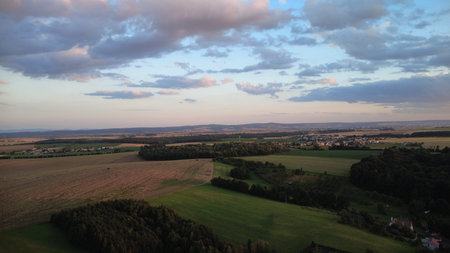 Aerial view of a rural landscape with fields and meadows at sunset. Czech Republic, Silesia,