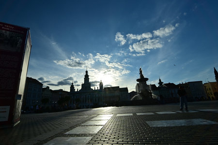 The Fountain of Neptune located at the historic town square of ÄeskÃ© BudÄjovice, Czech Republic, showcasing Baroque architecture and vibrant city atmosphere.の写真素材