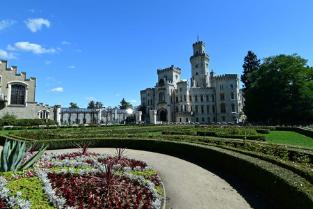 Chateau park and gardens at HlubokÃ¡ nad Vltavou Castle in South Bohemia, Czech Republic, on a sunny day. Beautifully landscaped green lawns, decorative flowerbeds.の写真素材