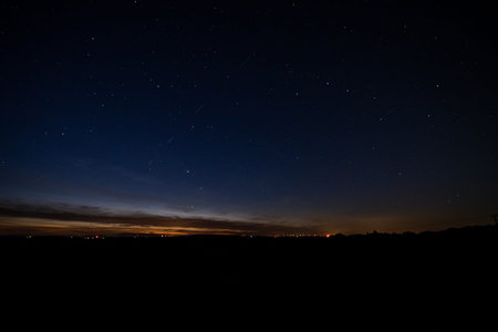 Night sky with stars and milky way. Long exposure photograph.
