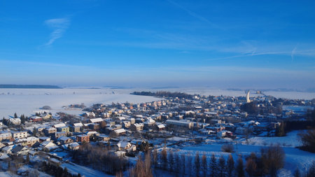 Aerial view of the village in winter. View from above.の写真素材