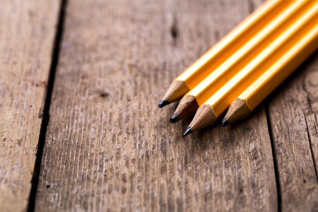 pencils on wood backgroundの写真素材