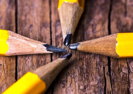 a simple pencil, pencil , wooden background , top viewの写真素材