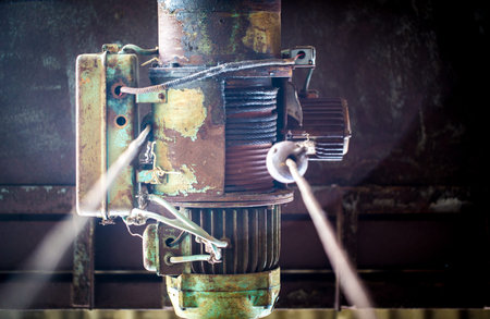 old motor to hook in an abandoned warehouse