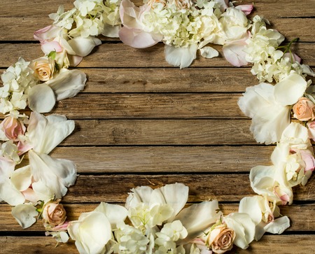 beautiful fresh flowers on wooden background, various flowers, place for text, closeupの写真素材