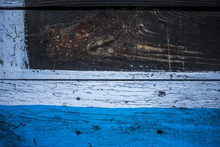 Vintage wooden dark wood, half painted in blue. Front view with copy space. The horizontal Board. Background for design. wooden background. Autumnの写真素材