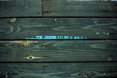 Vintage dark wooden Board, spray paint. Front view with copy space. The horizontal Board. Background for design. Wooden background.の写真素材