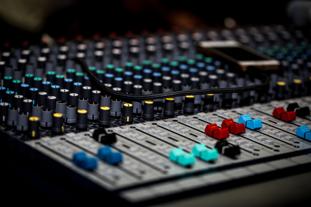 fader digital mixing console with volume meter, volume indicator, closeupの写真素材