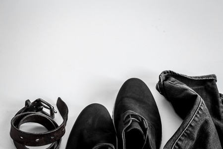 Set of mens clothing jeans, shoes,belt, on a white backgroundの写真素材