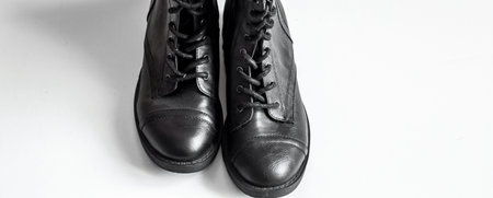 black high boots on a white background