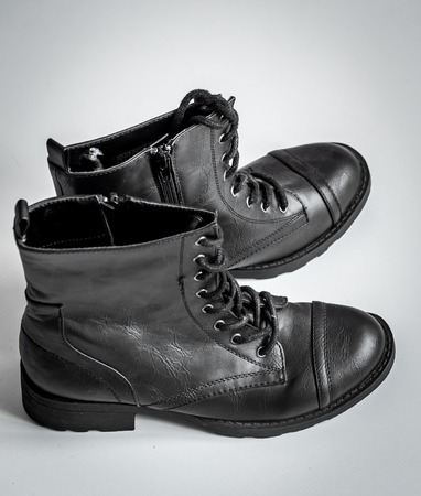 black high boots on a white backgroundの写真素材