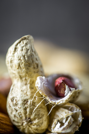 Different mix of nuts closeup on wooden backgroundの写真素材
