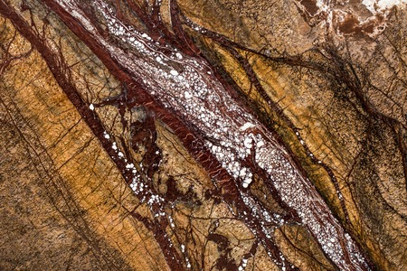 natural beautiful marble in dark and warm colors, contrasting rich colors, marble background texture, closeup, marble set with eight photosの写真素材
