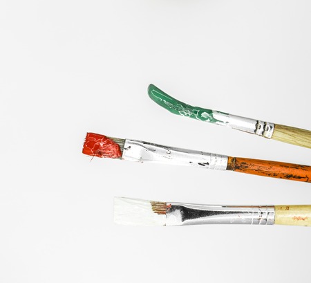 The brush in paint closeup isolated on white backgroundの写真素材