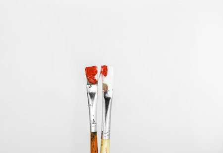 The brush in paint closeup isolated on white backgroundの写真素材