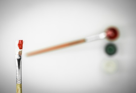 The brush in paint closeup isolated on white backgroundの写真素材
