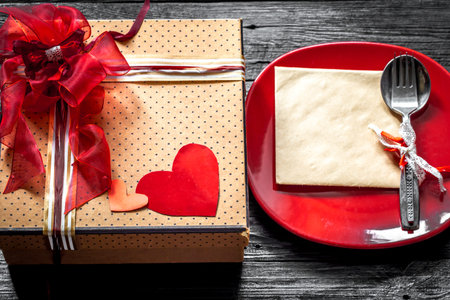 beautiful dining set on Valentine,laying on wooden background,holiday conceptの写真素材