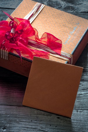 beautiful gift box for Valentine,lying on wooden background,holiday conceptの写真素材