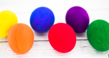 colorful eggs on wooden backgroundの写真素材