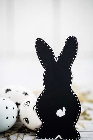 Beautiful Easter composition with eggs and rabbit isolated on white backgroundの写真素材