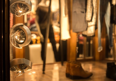 small round light Windows with different clothesの写真素材