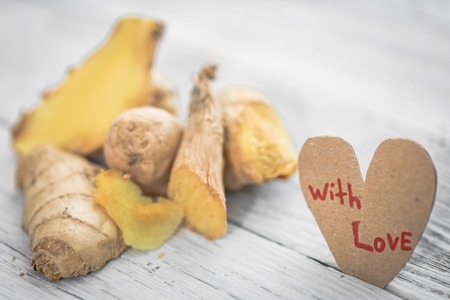 fresh ginger on a wooden background,concept of healthy nutritionの写真素材