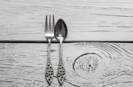 beautiful vintage Cutlery on white wooden backgroundの写真素材