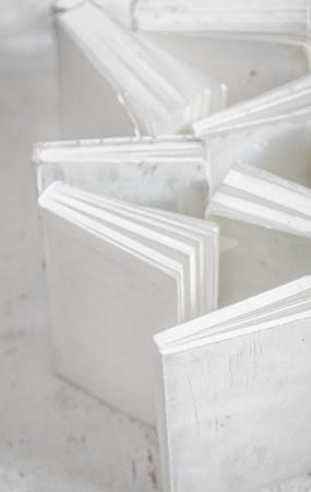 the white book on wooden background with space for text, concept of knowledge and informationの写真素材