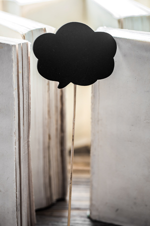 white paper on wood background with space for text, concept of knowledge and informationの写真素材