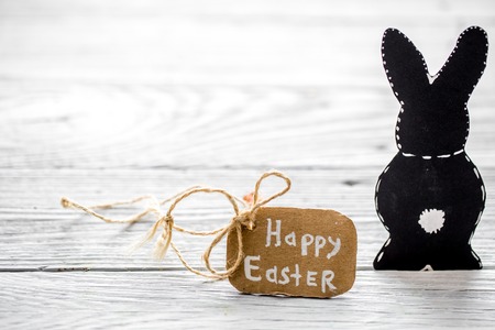 Easter bunnies on a light wooden background, holiday conceptの写真素材